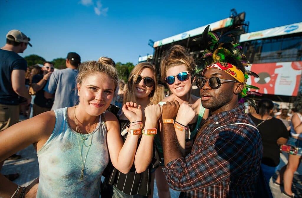 festival-goers-showing-their-music-midtown-festival-wristbands