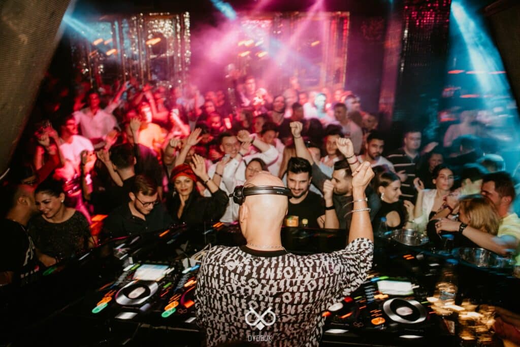 local-dj-playing-in-front-of-crowds-at-dybbuk-athens