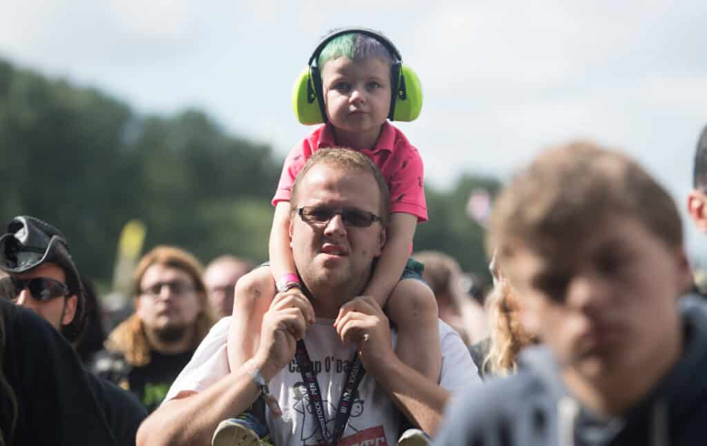 bloodstock-festival-attendee-holding-a-child