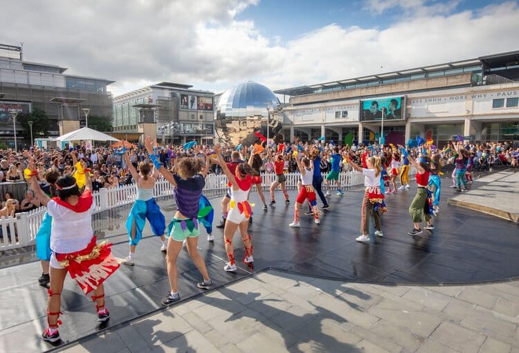 people-dancing-at-the-millennium-square-bristol