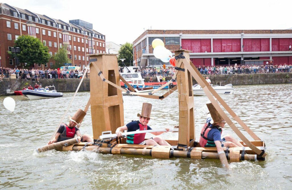 people-rowing-a-cardboard-boat-at-bristol-harbour