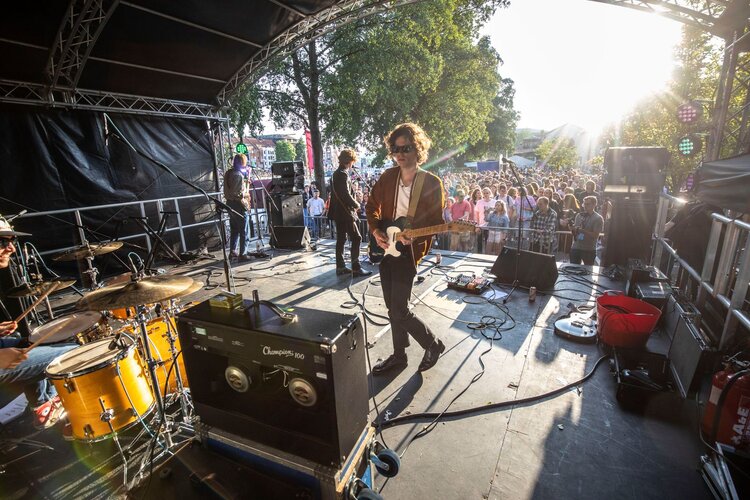 band-perfoming-on-stage-at-bristol-harbour-festival