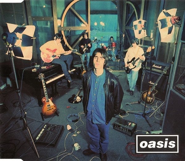 members-of-oasis-band-in-a-studio