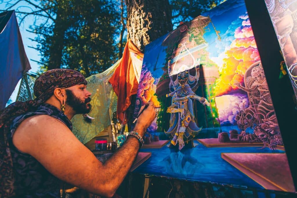 man-painting-at-desert-hearts-festival