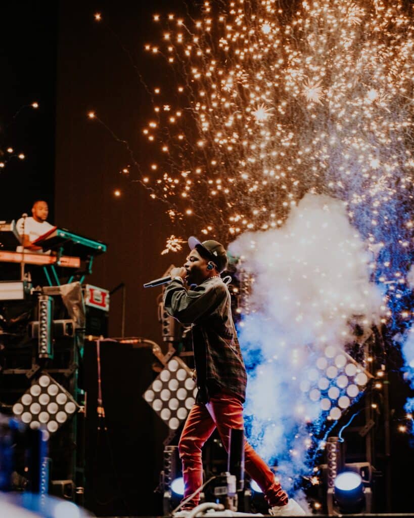 artist-performing-on-stage-at-Bonnaroo-festival