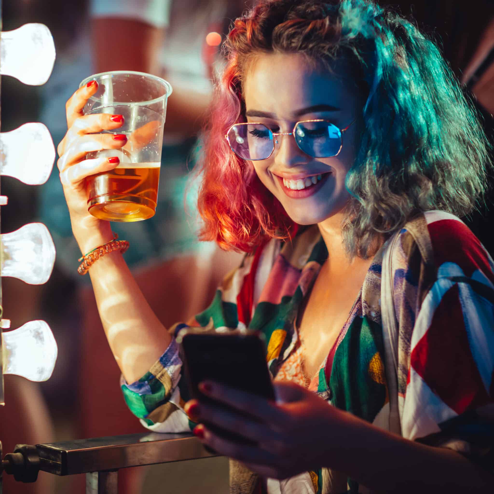 girl-scrolling-on-social-media-in-nightclub
